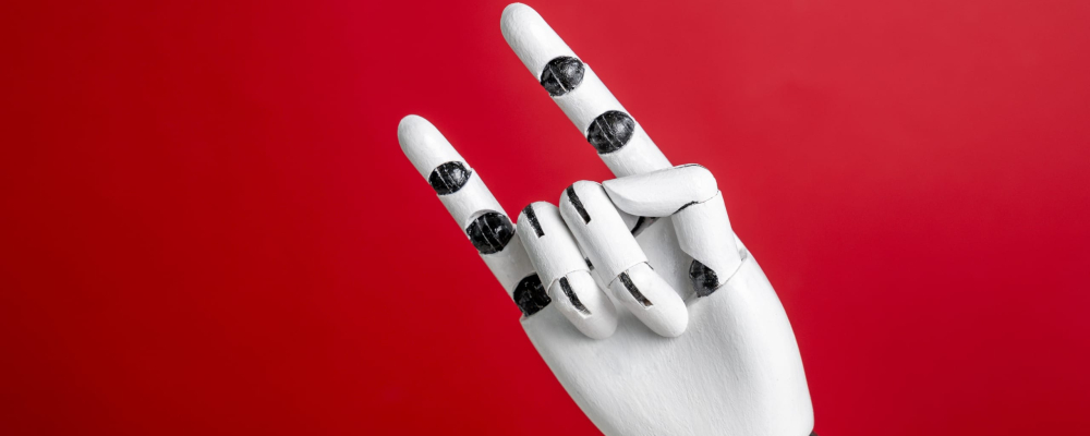 Human-like black and white robot hand gesture horns or rock on red background. AI and real live concept